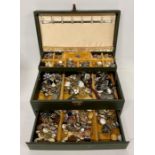 A Jewellery box with a large volume of costume jewellery