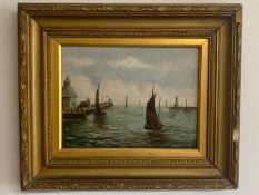 An oil on canvas of 'Sailing boats in harbour' within a gilt frame (Frame size 39x46.5cm)