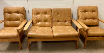 A Mid Century wooden suite with faux leather seats