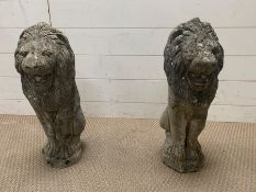 A Pair of Lion garden statues, weathered.
