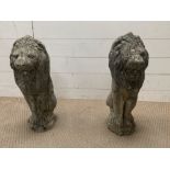 A Pair of Lion garden statues, weathered.