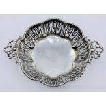 A Hallmarked silver pierced bowl with bow shaped handles, by E S Barnsley & Co (Edward Souter