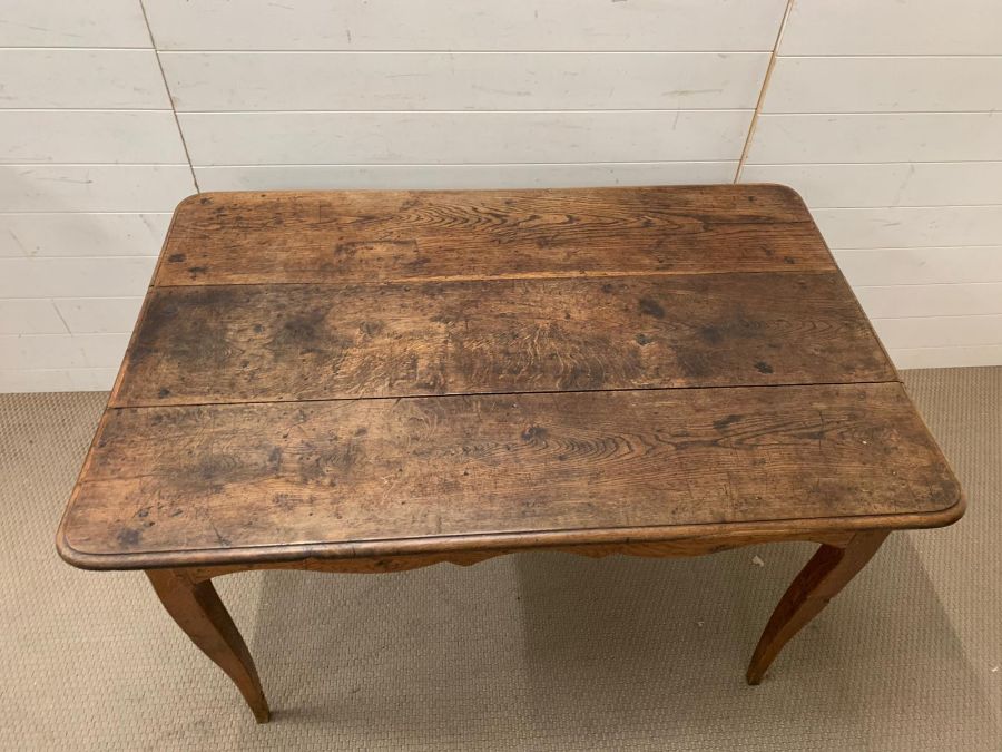 A French oak farm house table, three plank top with drawer C1840's (H78cm W128cm D83cm) - Image 3 of 3