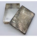 Two white metal boxes one with a playing card lid and the other a shell