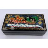 Small Russian lacquer box, signed,(9.5cm x 4.5cm x 3cm)