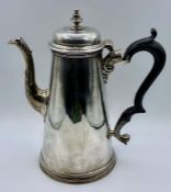 A silver coffee pot, hallmarked for London 1737, (810g), handle AF.