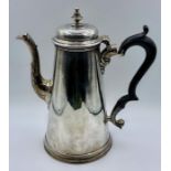 A silver coffee pot, hallmarked for London 1737, (810g), handle AF.