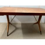 A Mid Century Swedish teak desk or dining table with brass caps and feet (H74cm W147cm D80cm) (
