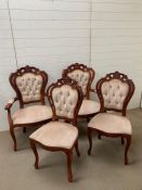 Four carved dining chairs with button backs