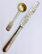 Silver knife and a mustard spoon.