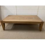 An oak coffee table with chrome inlay and chrome bows to top (180 cm w x 80 cm d x 45 cm h)