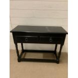 A small side table with drawers to base (H60cm W80cm D30cm)