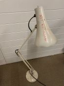 A vintage angle poise lamp with helpful slogan to side a/f