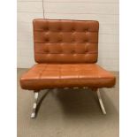 A Barcelona chair, dark tan possibly Kroll, 17 straps and 40 square pieces leather and rivet