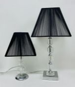 Two glass and chrome table lamps