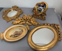 A selection of gilt frame mirrors and small tray.