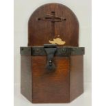 An antique church collection box