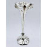 A single stem silver vase, London hallmarks, weighted to base