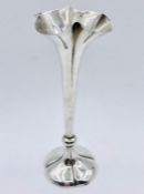 A single stem silver vase, London hallmarks, weighted to base