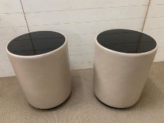 A pair of contemporary drum side tables with faux leather and glass top (H60cm Dia45cm)