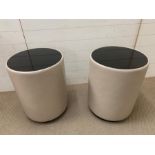 A pair of contemporary drum side tables with faux leather and glass top (H60cm Dia45cm)