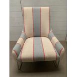 A contemporary arm chair with striped upholstery on chrome feet (W 77 cm x D 80 cm x H 98cm)