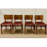 A set of four Beautility dining chairs