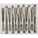 A set of six silver knives and forks (Total weight 330g) hallmarked for Sheffield 1925 by James