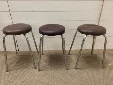 Three chrome stools