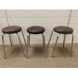 Three chrome stools