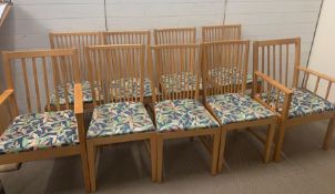 Nine stick back dining chairs with floral leaf pattern seat pad cover