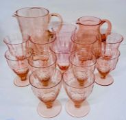 A selection of pink glass consisting of goblets and jugs