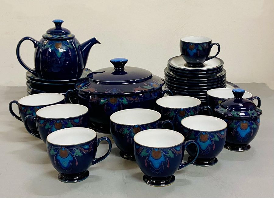 A selection of Denby, Baroque pattern to include: three dinner plates, five bowls, teapot, sugar