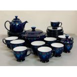 A selection of Denby, Baroque pattern to include: three dinner plates, five bowls, teapot, sugar