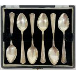 A Boxed set of six silver teaspoons by AC, hallmarked for Sheffield 1945.