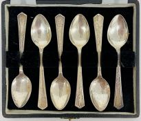 A Boxed set of six silver teaspoons by AC, hallmarked for Sheffield 1945.