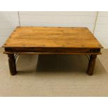 An Indian hardwood coffee table (H46m W110cm D60cm)