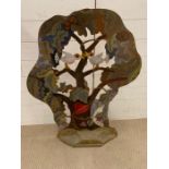 A standing art sculpture painted on a wooden base (H98cm W70cm)