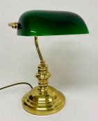 A Bankers desk lamp with green shade