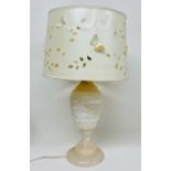 A white marble table lamp with shade