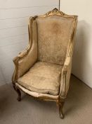 A French Louis XV style high back chair. Gilt frame with scrolled arms (H118cm W67cm SH46cm)