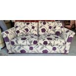 A Duresta three seater sofa, hand made in the UK with a hardwood frame and floral upholstery (W210cm