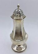 A silver sugar shaker with indistinct hallmarks, 101g.