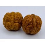 Two antique Chinese carved walnuts