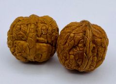 Two antique Chinese carved walnuts