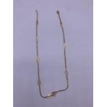 A 14 ct gold broken necklace (2.3g)
