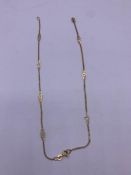 A 14 ct gold broken necklace (2.3g)