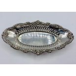 A pierced silver bonbon dish, hallmarked for London 1908, by Robert Pringle & Sons