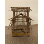 A wooden bird cage (H50cm W37cm)