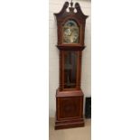 A Mahogany Long case clock, the case with scrolled pediment and turned wood finials